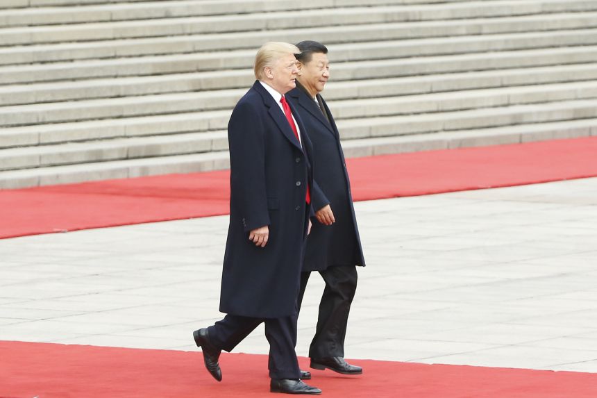 Chinese President Xi Jinping and U.S. President Donald Trump attend a welcoming ceremony in Beijing, on November 9, 2017.