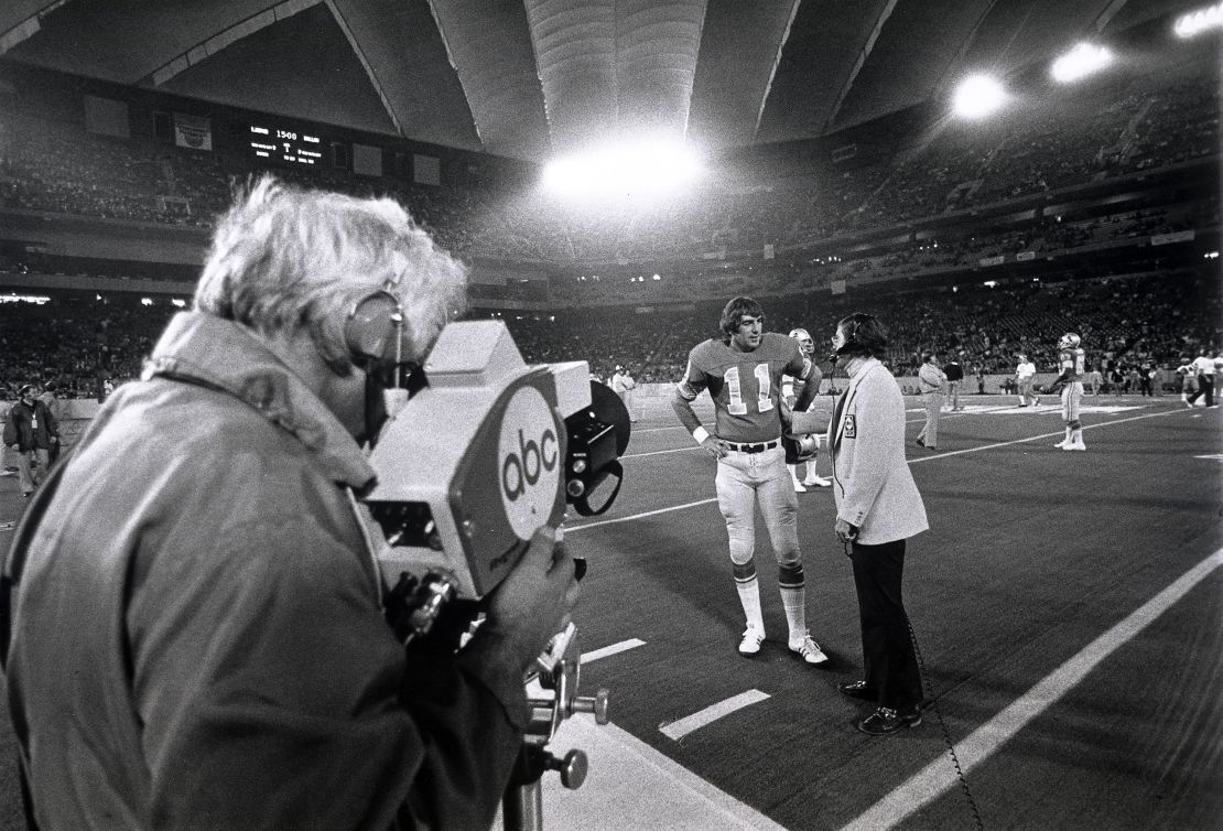 Sports crew at Dallas Cowboys / Detroit Lions game on 'Monday Night Football' in 1975.