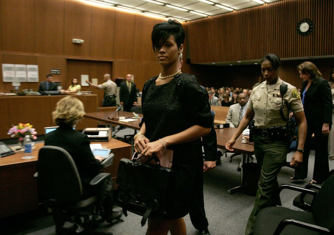 Rihanna walks out of a preliminary hearing at Superior Court of Los Angeles County on June 23, 2009.