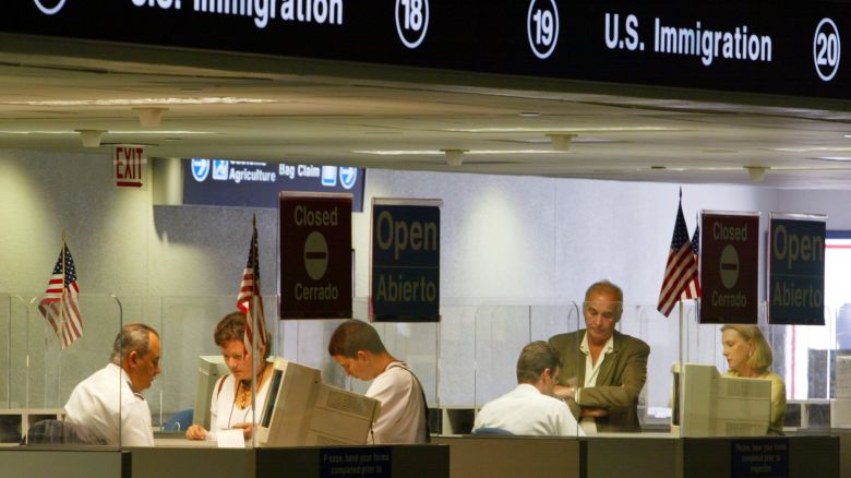 MIAMI - JULY 2:  MIAMI - JULY 2:  U.S. Immigration  inspectors check ports July 2, 2002 at Miami International Airport in Miami, Forida. Inspectors are using the new multi-agency DataShare database which inspectors use to view not only biographic information but also pictures of visa holders. At more than 300 ports of entry across the U.S. the new system is being used for visa holders who receive their documents at consular posts around the world. While information on  immigrant visas has been available through DataShare since 1995, information on temporary visitors, or non-immigrants, has been widely available on DataShare only since January of this year. The addition of non-immigrant information to the DataShare system was put on a fast-track immediately following the September terrorist attacks.  (Photo by Joe Raedle/Getty Images) 