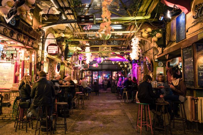 <strong>9. Budapest: </strong>Come for the world-famous <a >ruin bars</a>, stay for the new wave of nightlife spots in the Hungarian capital, says Time Out. The mammoth Szimpla Kert, one of the city's most famous ruin bars, is pictured.