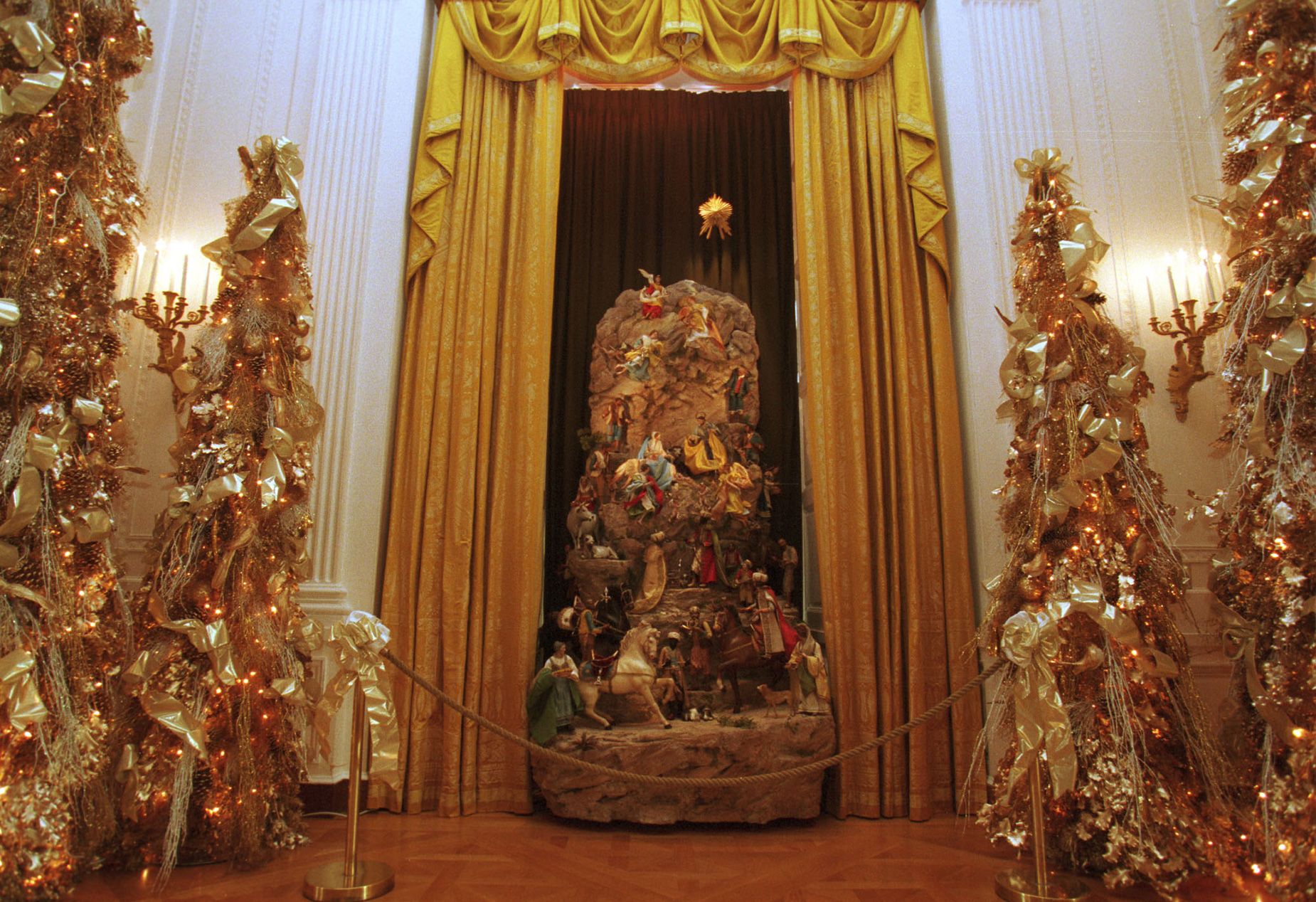 <strong>1998: </strong>Clinton's shimmering gilt decorations for the year centered on the theme "A Winter Wonderland."
