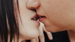 Close up of Middle Eastern couple kissing
