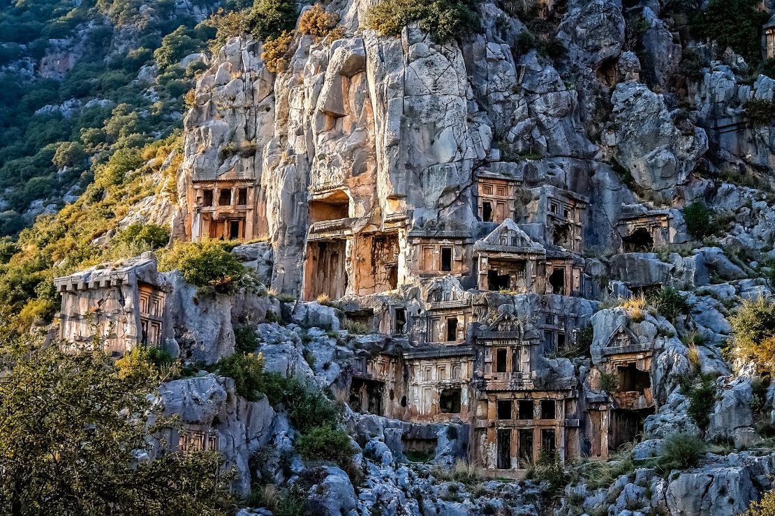 A cascade of rock-cut tombs sits above the ancient city of Myra.