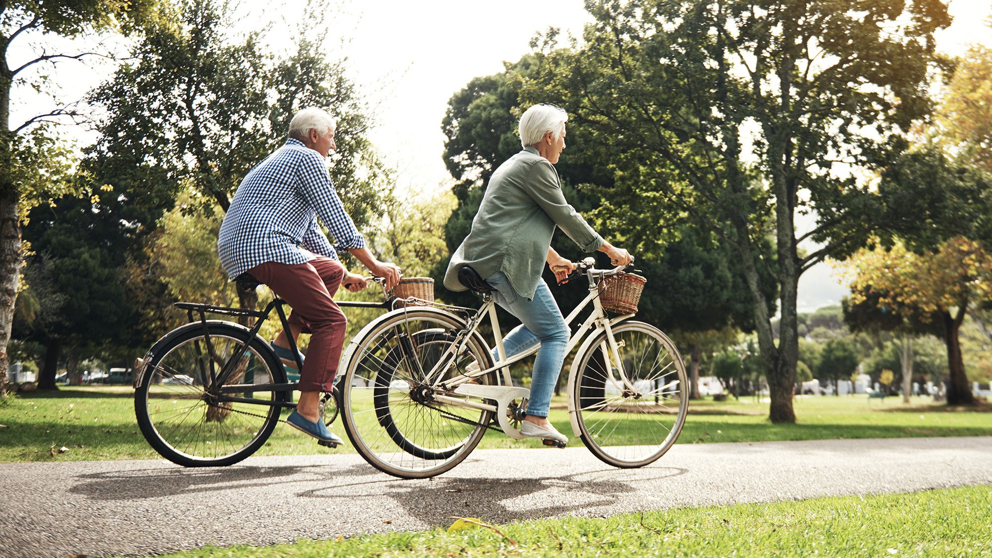 Shot of a senior couple going for a bicycle ride in the park