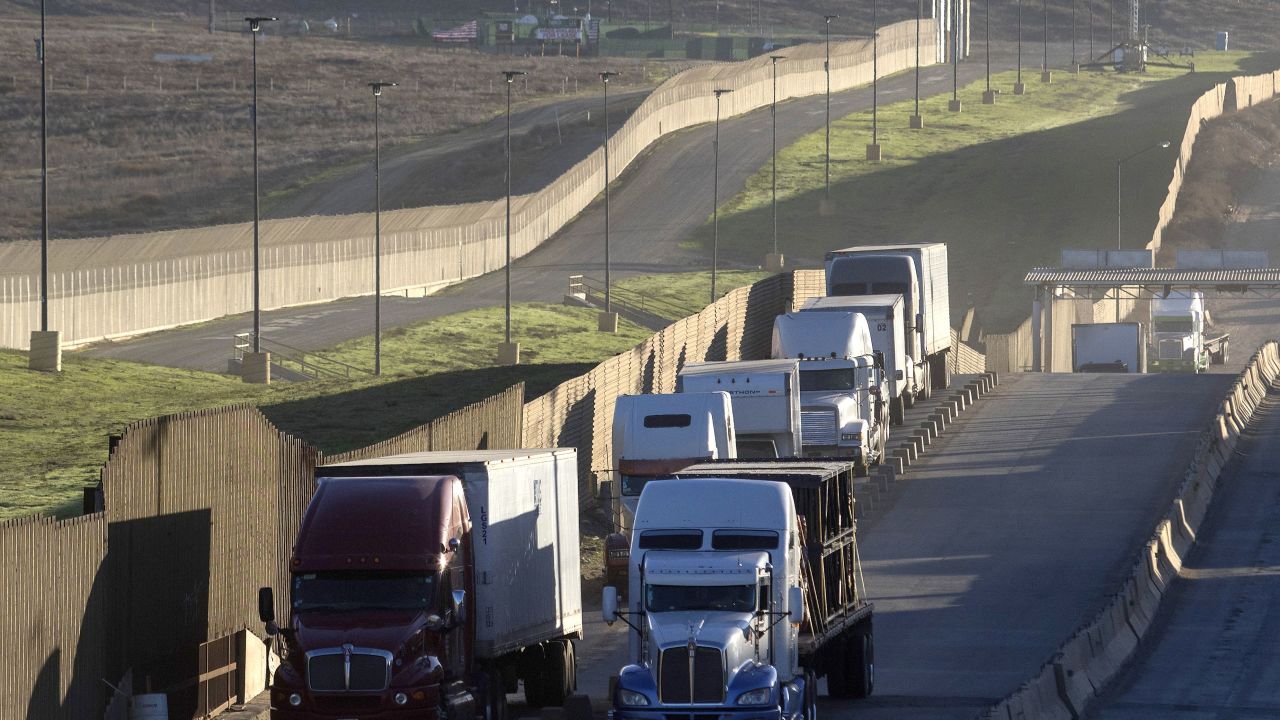 Trucks drive to cross the border with the United States at Otay Mesa Commercial Port of Entry in Tijuana, Mexico on January 22, 2018. Negotiators from Canada, Mexico and the United States on Tuesday will kick off the sixth round of talks aimed at revamping the North American Free Trade Agreement (NAFTA) in Montreal. (Photo by GUILLERMO ARIAS / AFP) (Photo by GUILLERMO ARIAS/AFP via Getty Images)