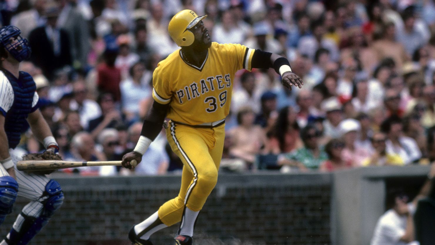 Pittsburgh Pirates slugger Dave Parker watches the flight of his ball against the Chicago Cubs at Wrigley Field in Chicago in the 1970s.