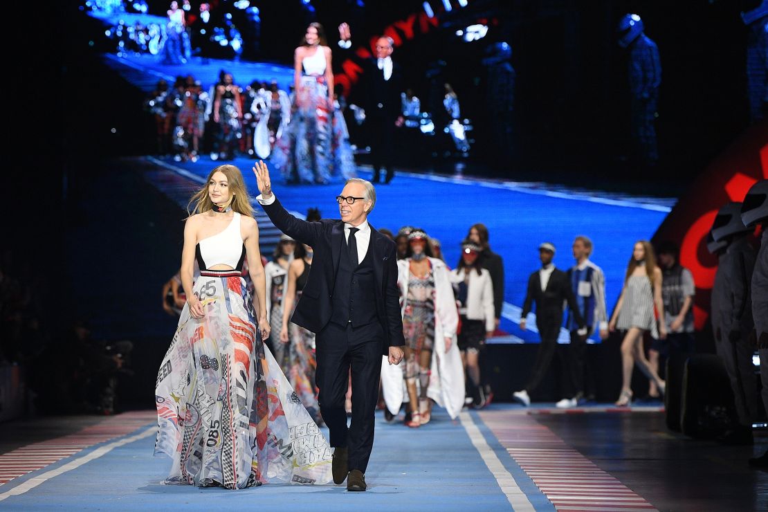 Gigi Hadid and Tommy Hilfiger walk the runway at the Tommy Hilfiger's Fall-Winter 2018 show during Milan Fashion Week on February 25, 2018.