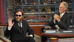 Actor Joaquin Phoenix, waves to the audience during his interview with Late Show host David Letterman during the Late Show with David Letterman Wednesday, February 11, 2009 on the CBS Television Network.