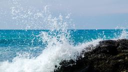 HAAD SAI KHAO, TRAT PROVINCE, THAILAND - 2017/12/28: Spraying foam of a wave breaking at a rock at White Sand Beach on Koh Chang. (Photo by Frank Bienewald/LightRocket via Getty Images)