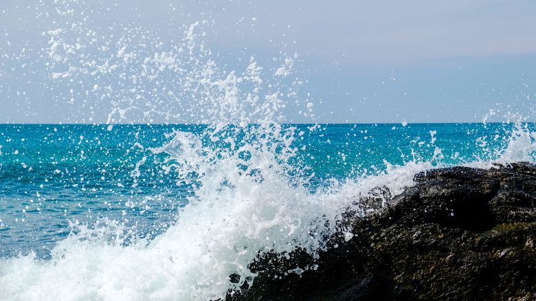 HAAD SAI KHAO, TRAT PROVINCE, THAILAND - 2017/12/28: Spraying foam of a wave breaking at a rock at White Sand Beach on Koh Chang. (Photo by Frank Bienewald/LightRocket via Getty Images)