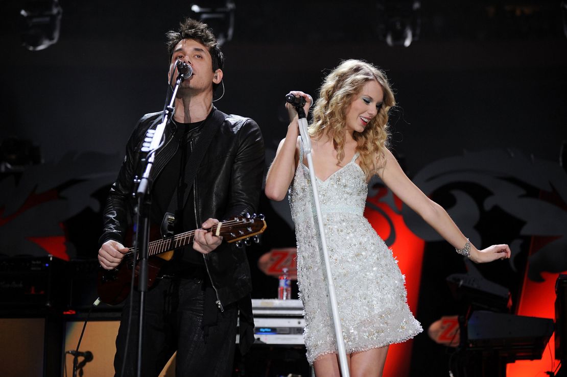 John Mayer and Taylor Swift perform onstage in 2009.
