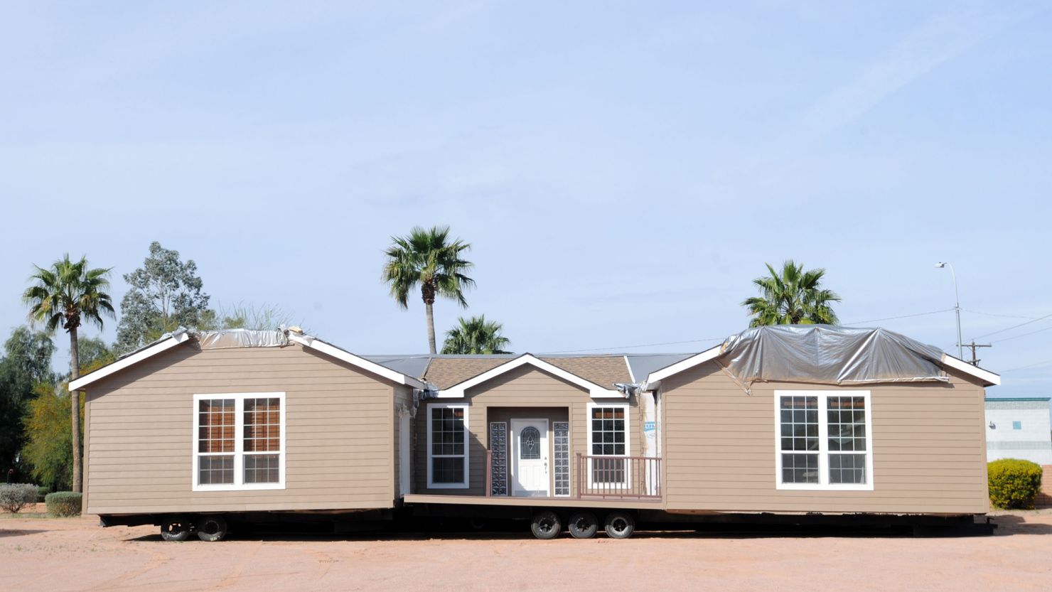 A model home sits on a flatbed at the Clayton Homes of Mesa in Mesa, Arizona, U.S., on Tuesday March 3, 2009.