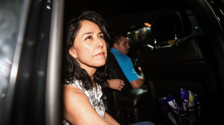 The wife of Peru's former President Ollanta Humala, Nadine Heredia, prepares to get out of a car as she arrives at her house after being in preventative detention awaiting trial on charges of money laundering, in Lima on April 30, 2018. - The pair, who allegedly received millions of dollars in illegal campaign donations from Brazilian construction giant Odebrecht ahead of the 2011 election, had been in prison since July 2017. (Photo by ERNESTO BENAVIDES / AFP)        (Photo credit should read ERNESTO BENAVIDES/AFP via Getty Images)