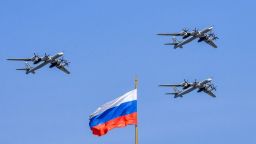 Russian Tupolev Tu-95 turboprop-powered strategic bombers fly above the Kremlin during a rehearsal for the Victory Day military parade in Moscow on May 4, 2018. - Russia celebrates the 73rd anniversary of the 1945 victory over Nazi  on May 9. (Photo by Yuri KADOBNOV / AFP)        (Photo credit should read YURI KADOBNOV/AFP via Getty Images)