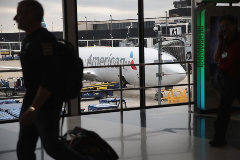 American Airlines is raising checked luggage prices CNN Business