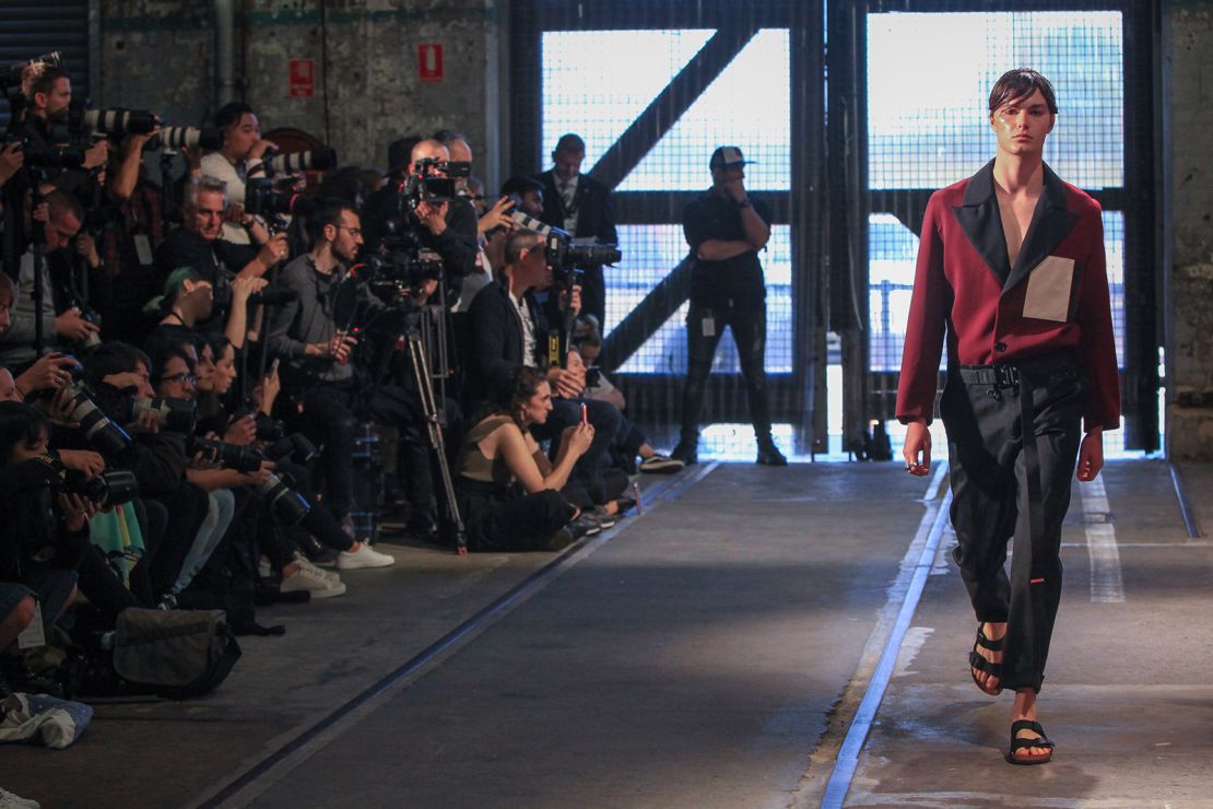 A model walks the runway in Birkenstocks during designer Blair Archibald's Resort 2019 show in Sydney, Australia.