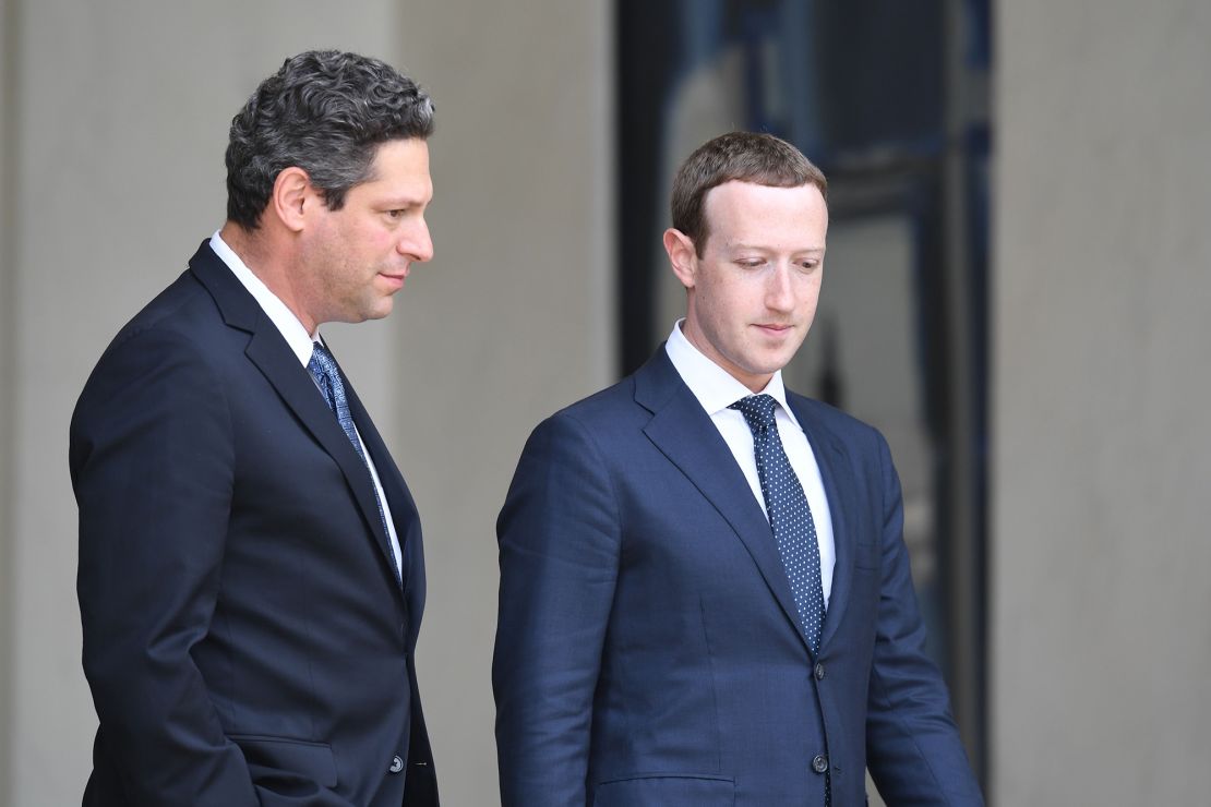 Facebook CEO Mark Zuckerberg with by Facebook's then-vice president of global public policy, Joel Kaplan, in Paris in 2018. Kaplan was promoted to the company's top policy job this year.