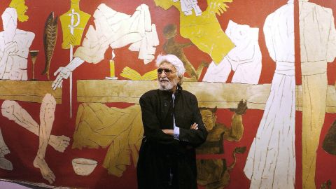 TO GO WITH India-Qatar-art-religion-Husain  (FILES) In this January 14, 2004 file photograph, Indian artist Maqbool Fida (M.F.) Husain poses for photographers at the inauguration of his exhibition '...and not only 88 of Husain' at the National Art Gallery in Bombay. India's best-known painter, who went into exile after receiving death threats from Hindu hardliners, has accepted Qatar's offer of citizenship, his son was quoted as saying February 27, 2010.  AFP PHOTO/FILES/Sebastian D'SOUZA (Photo credit should read SEBASTIAN D'SOUZA/AFP via Getty Images)