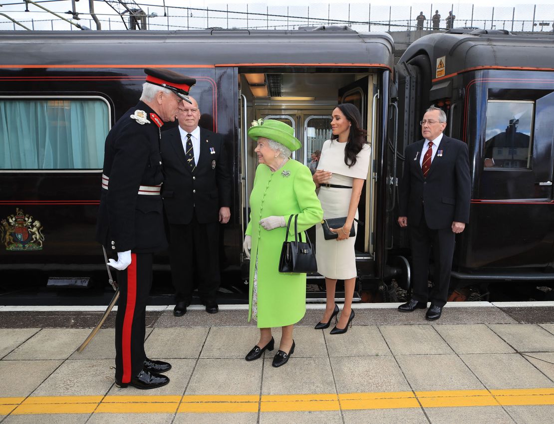 The late Queen Elizabeth and the Duchess of Sussex arrived by royal train at Runcorn Station to carry out engagements in Cheshire in June 2018.