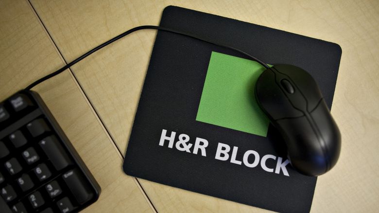 A computer mouse sits on a mousepad at an H&R Block office in New York, U.S., on Monday, March 8, 2010.
