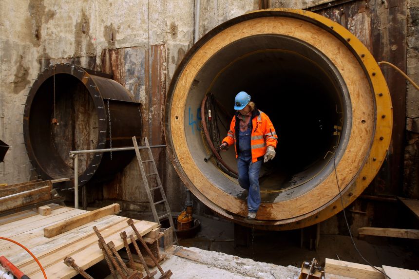 A worker emerges from a pipeline entrance near Lubmin, Germany, on April 8, 2010.