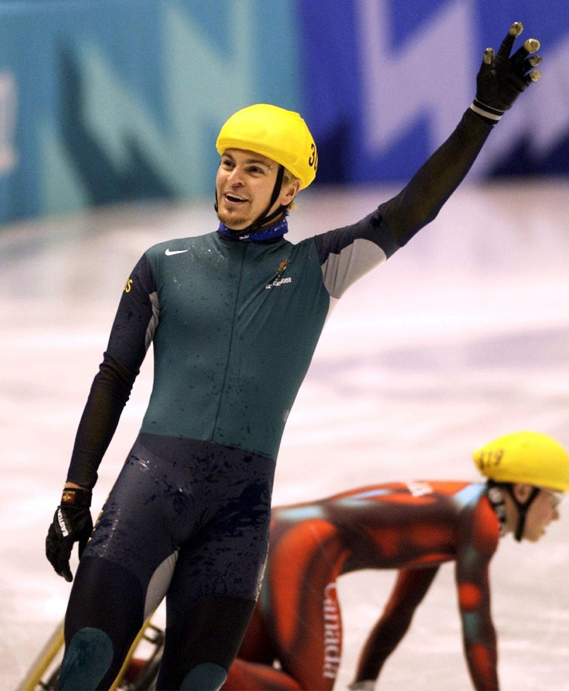 Australian Steven Bradbury waves to the crowd after winning gold in the men's 1,000-meter short-track speed skating finals at the 2002 Winter Olympics.