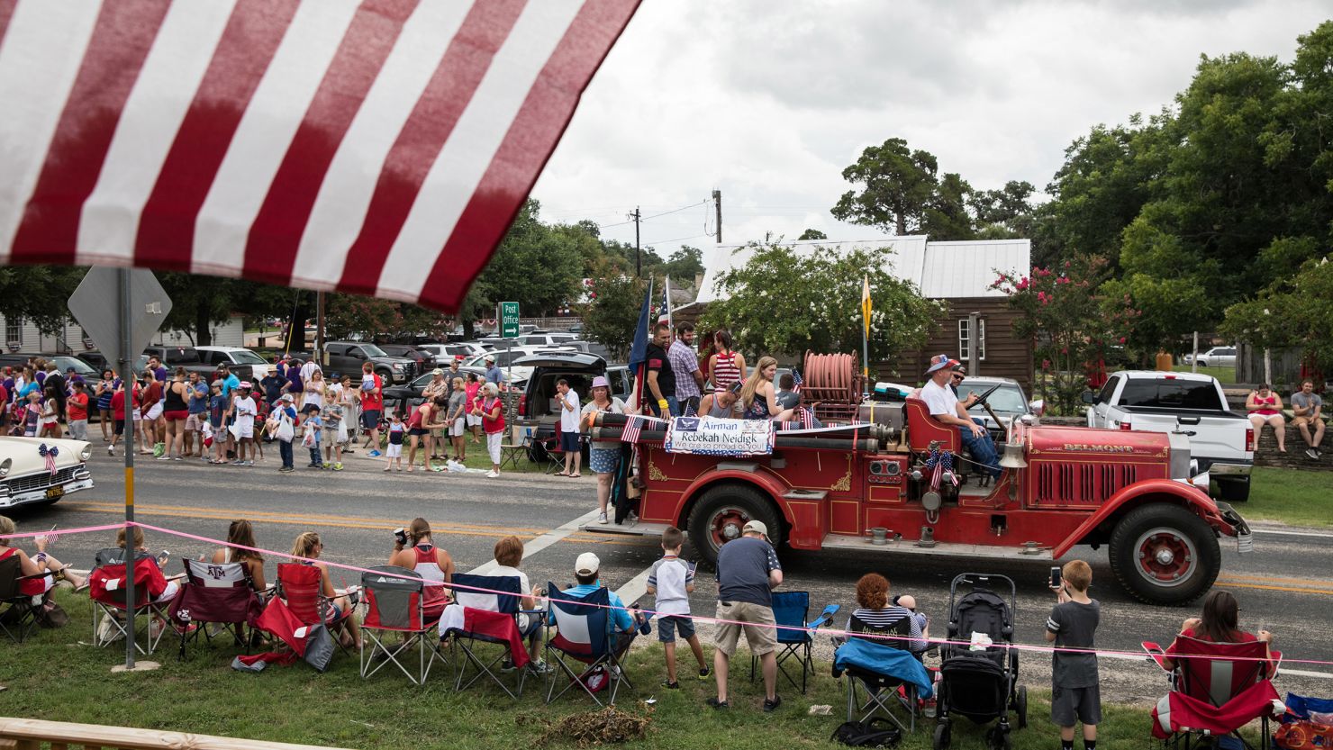 Spectators watch the 168th annual Round Top Fourth of July Parade in Round Top, Texas on July 4, 2018. The Round Top community's Fourth of July celebration started in 1851 and is known as the longest running Fourth of July celebration west of the Mississippi.