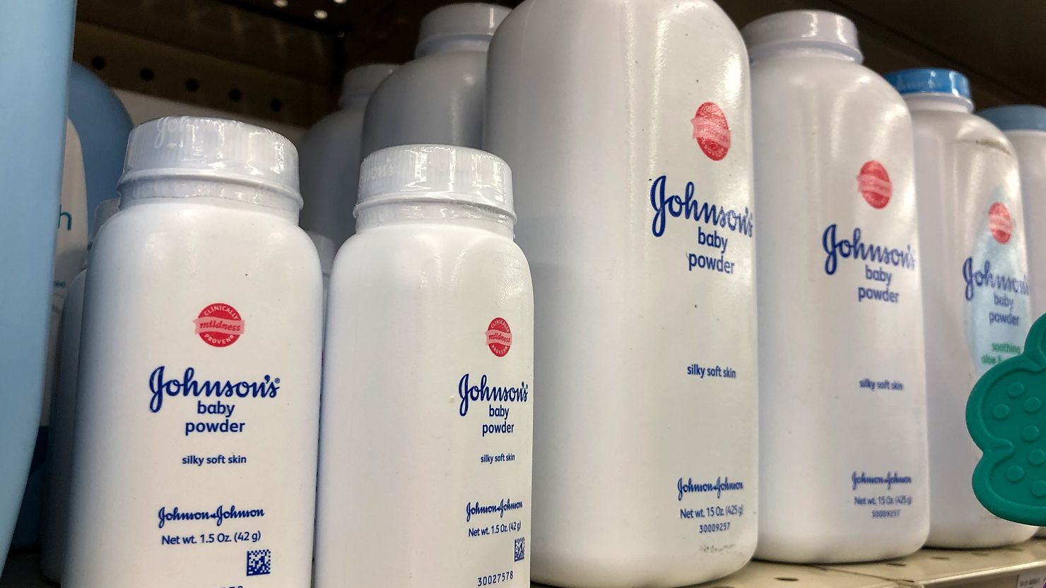 Containers of Johnson's baby powder made by Johnson and Johnson are displayed on a shelf on July 13, 2018 in San Francisco, California.