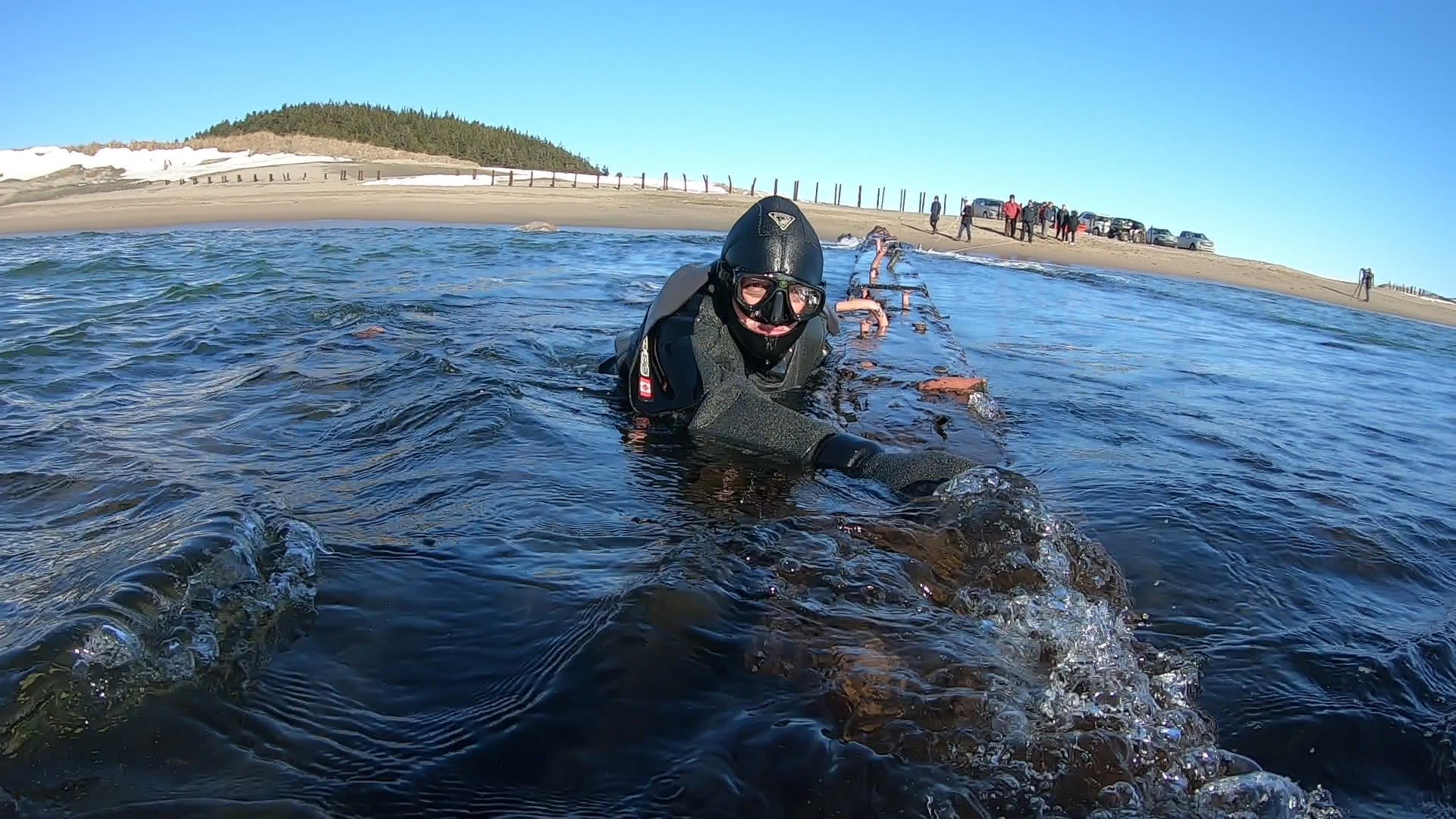 Shawn Bath, of the Clean Harbours Initiative, works to secure the shipwreck in Cape Ray, Newfoundland, Canada.