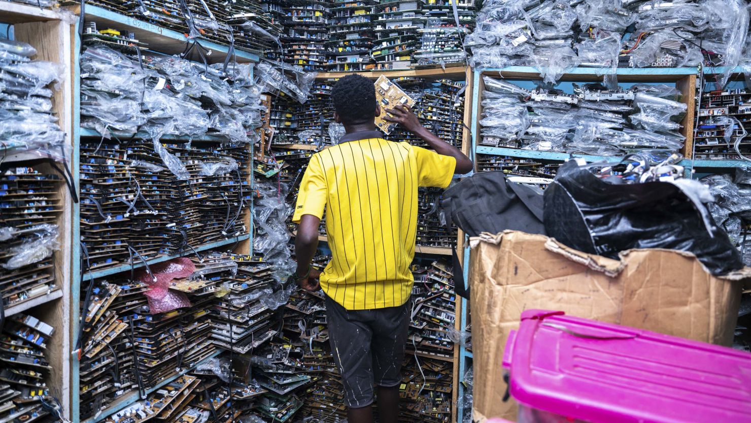 One of the hundreds of small shops for electronics in the narrow streets of an Accra neighborhood in Ghana. Here, broken electronics get dismantled and reused.