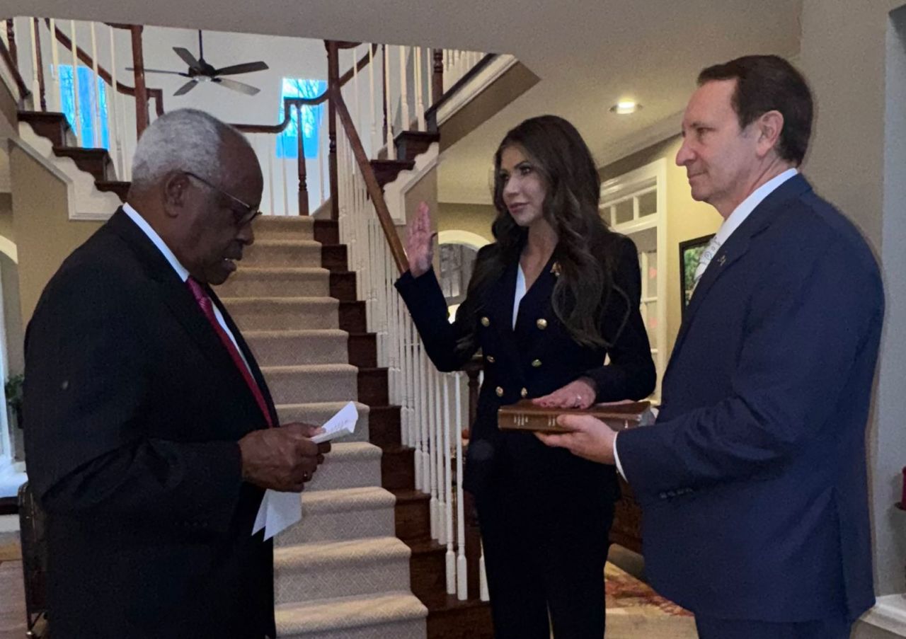 Kristi Noem is sworn in as secretary of the Homeland Security Department on Saturday afternoon.