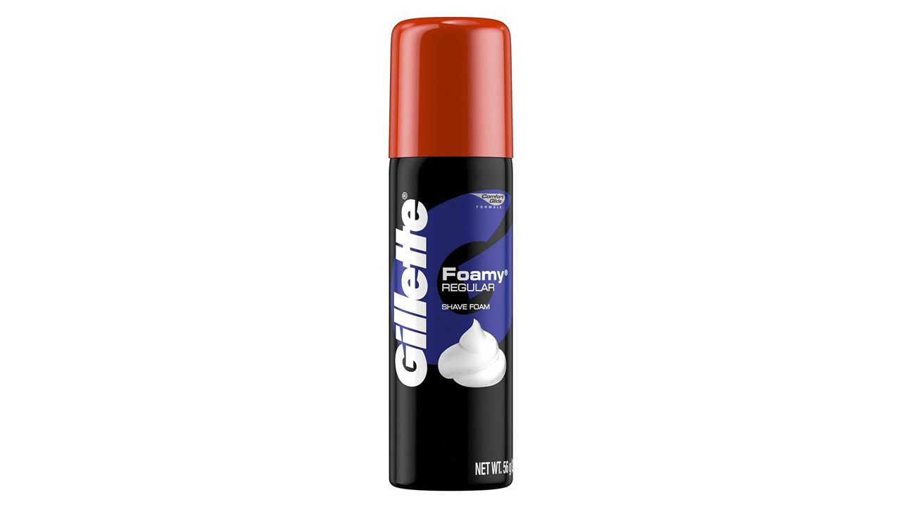 A photo of a travel-sized bottle of Gillette Foamy shaving cream