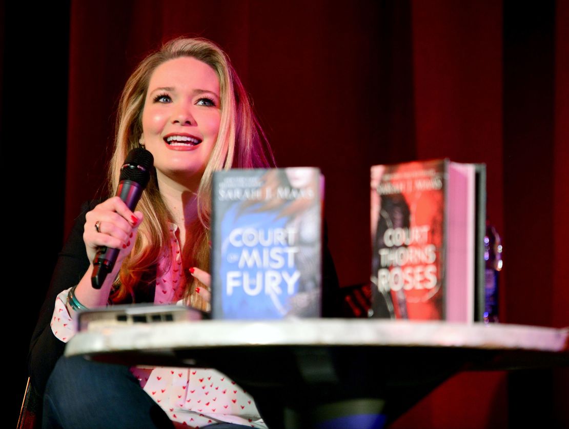 Sarah J. Maas speaks to fans at an event in 2016. After her books took off on TikTok last year, bookstores across the country hosted midnight release parties for her newest book, "House of Flame and Shadow."