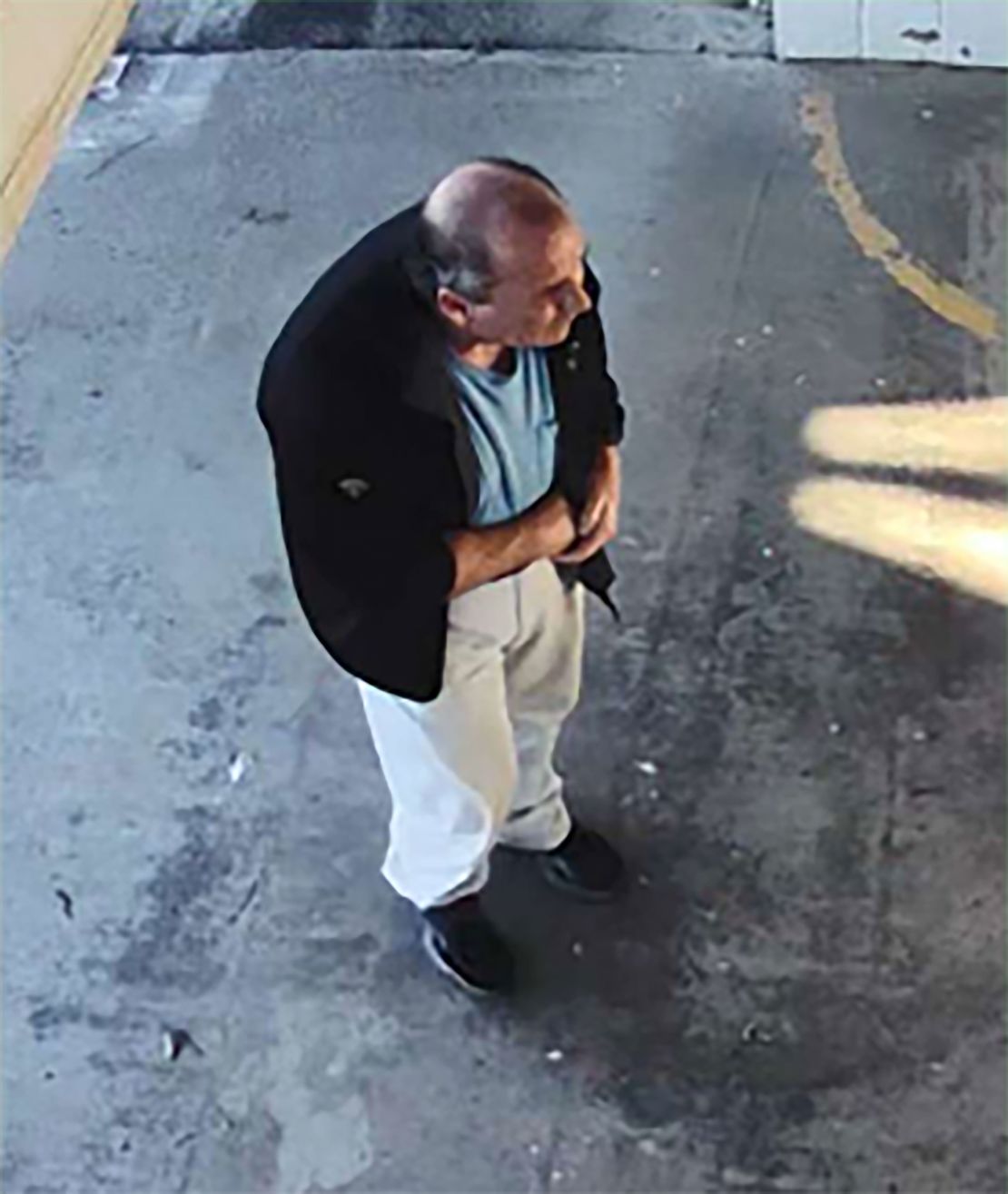 Litton was caught on surveillance footage standing outside the Feather River Adventist School. He is seen putting his right hand inside his jacket, near his waistband, where he was concealing his firearm, according to Butte County sheriff.