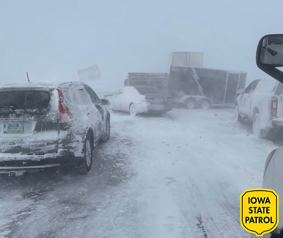 Stacked vehicles are seen on motorway 20, just west of the I-35, in Iowa during a storm.