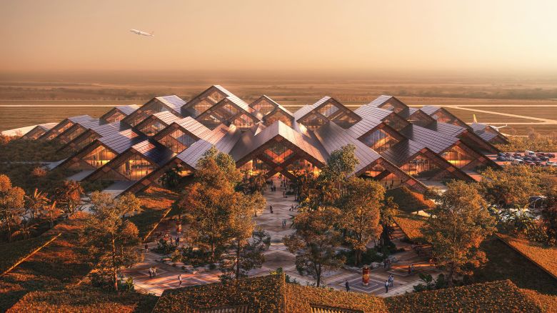 A rendering of Gelephu International Airport, designed by Bjarke Ingels and to be built in Bhutan. The quiet Himalayan country, which famously charges a $100/per day tourist tax in order to keep visitor numbers low, has envisioned the Gelephu “mindfulness city” as the future of its travel industry. 