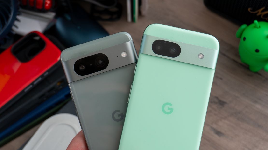 The green backs of the Pixel 8 and Pixel 8a. The 8a's Aloe color is brighter.