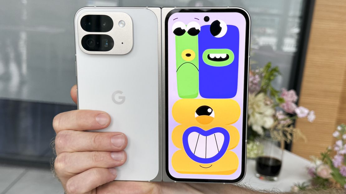 Animated green, blue and yellow characters appear on the unfolded Google Pixel 9 Pro Fold's front screen in Made You Look mode.