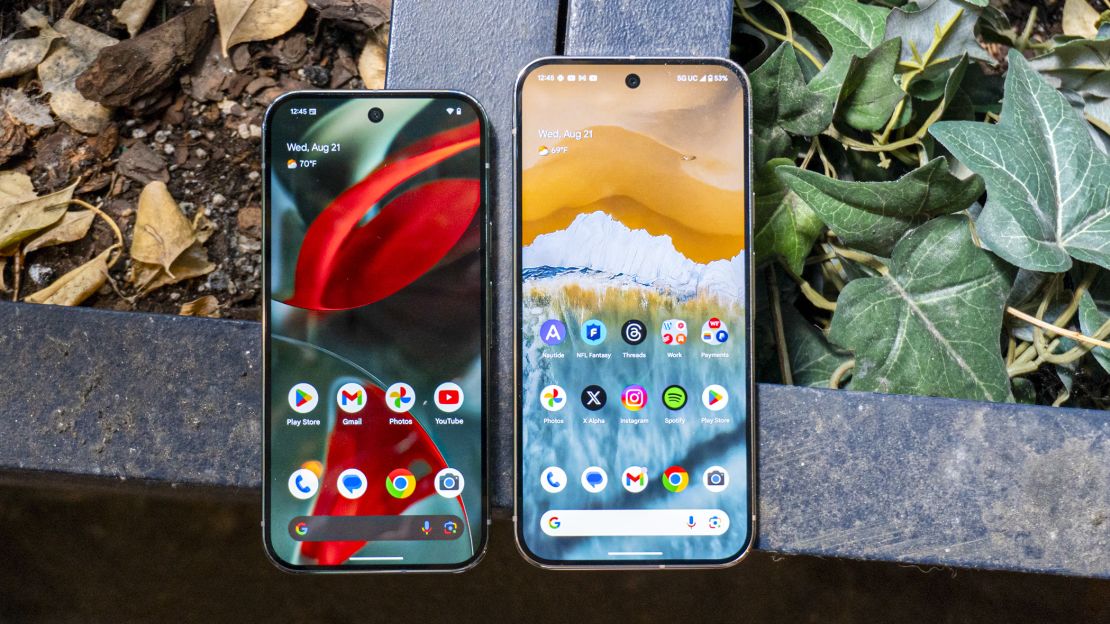 Google Pixel 9 Pro next to a Google Pixel 9 Pro XL, both of them are turned on and set to the home screen.