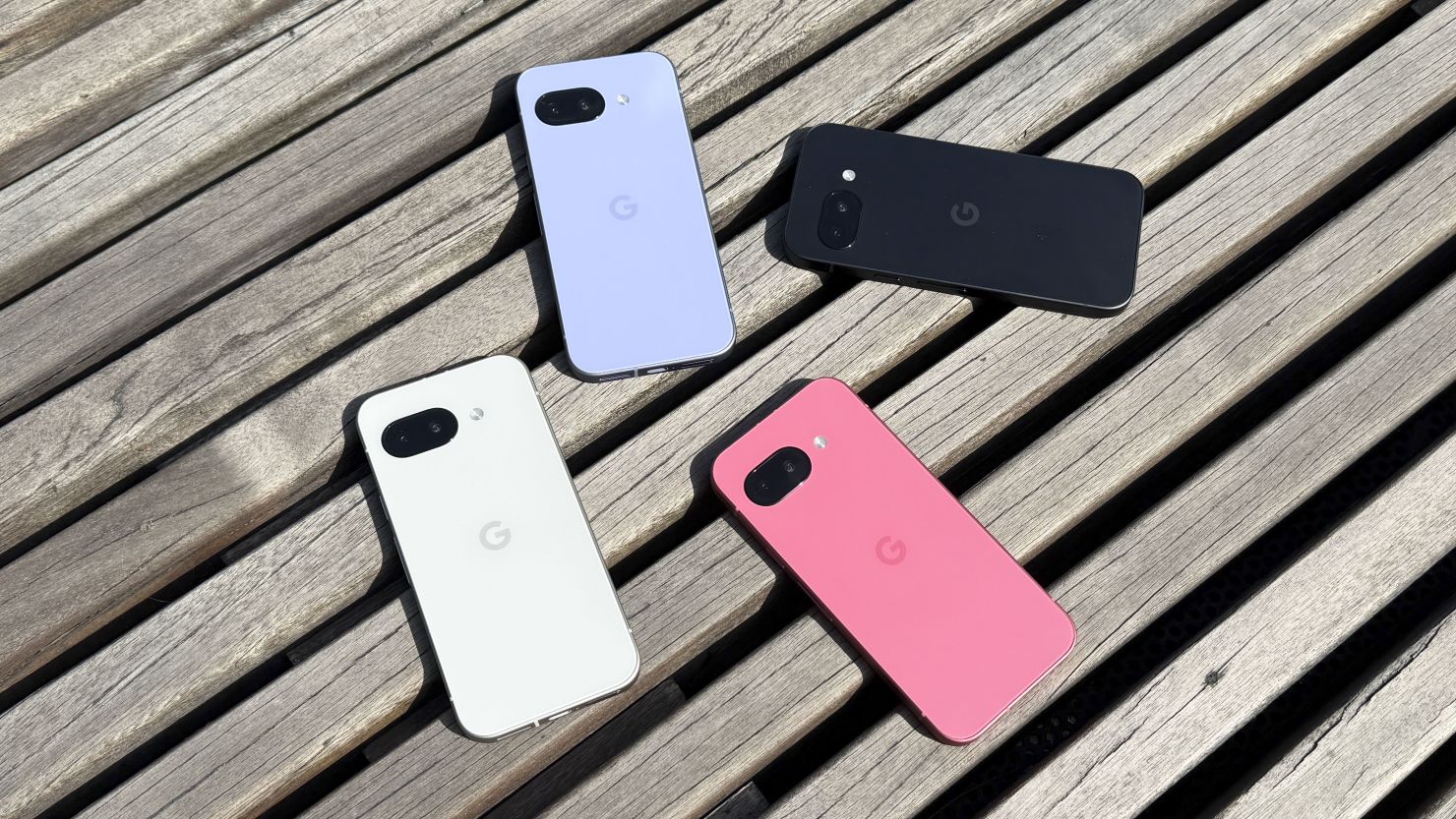 The white, pink, blue and black Google Pixel 9a phones