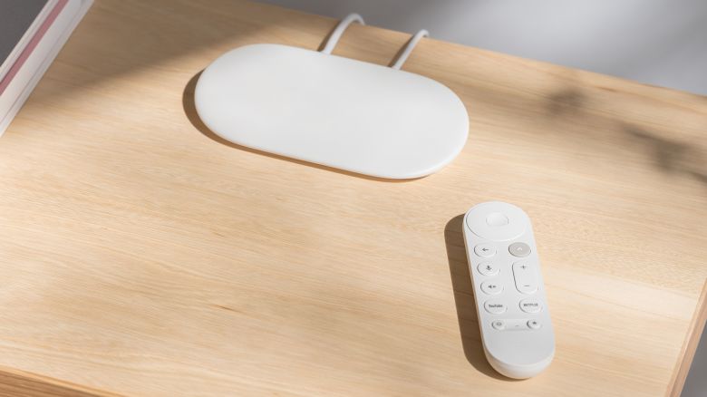 The white/porcelain google tv streamer and remote on a countertop