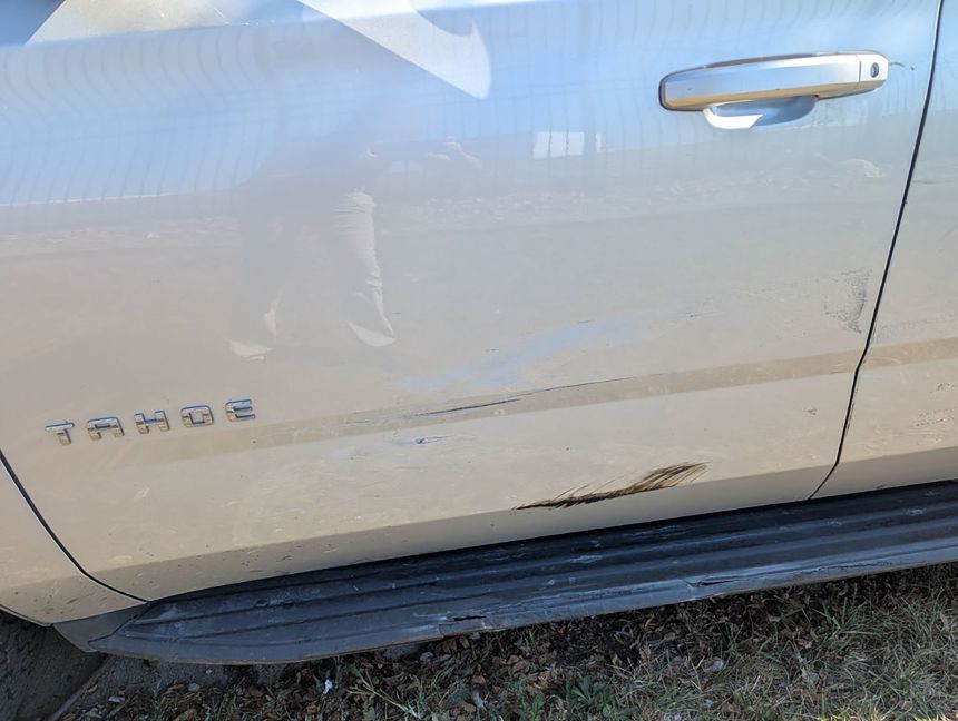 Damage to the driver's side of the CBP vehicle is seen in an image from a criminal complaint against Marimar Martinez.