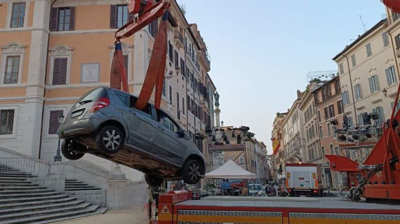 This image shared by Vigili del Fuoco, Italy’s fire and rescue service, shows a vehicle being removed after it drove down and got stuck on Rome’s Spanish Steps, on Tuesday, June 17, 2025.