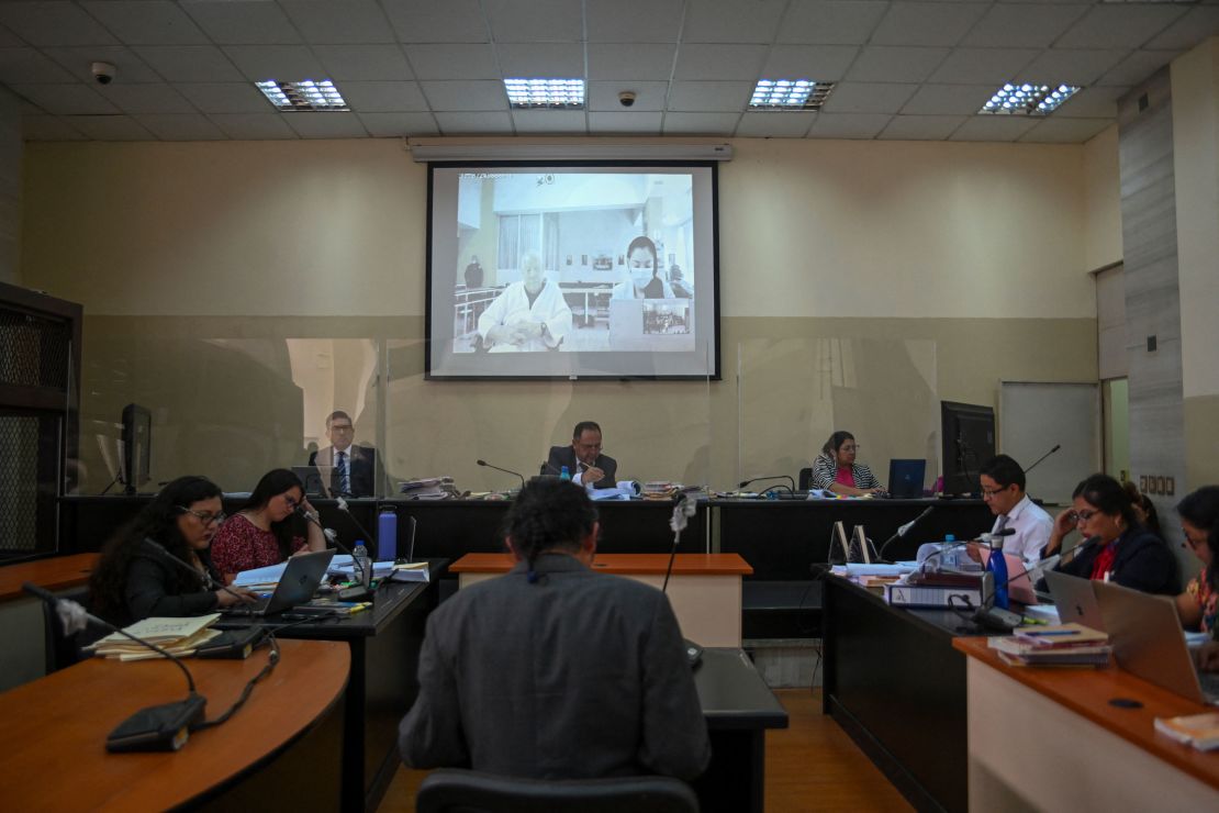 Retired General Benedicto Lucas Garcia (91) is seen on a screen during a video call from the ward of a military hospital where he is being held during his hearing at court in Guatemala City on April 5, 2024.