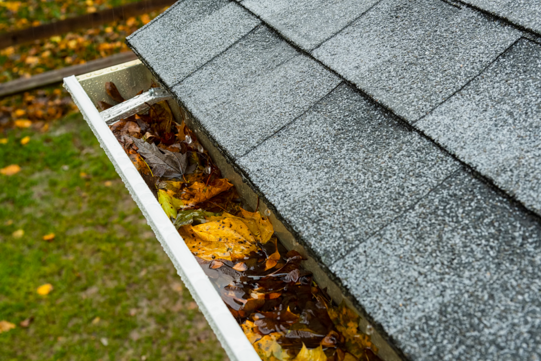 Rain dripping into seamless box-style gutter