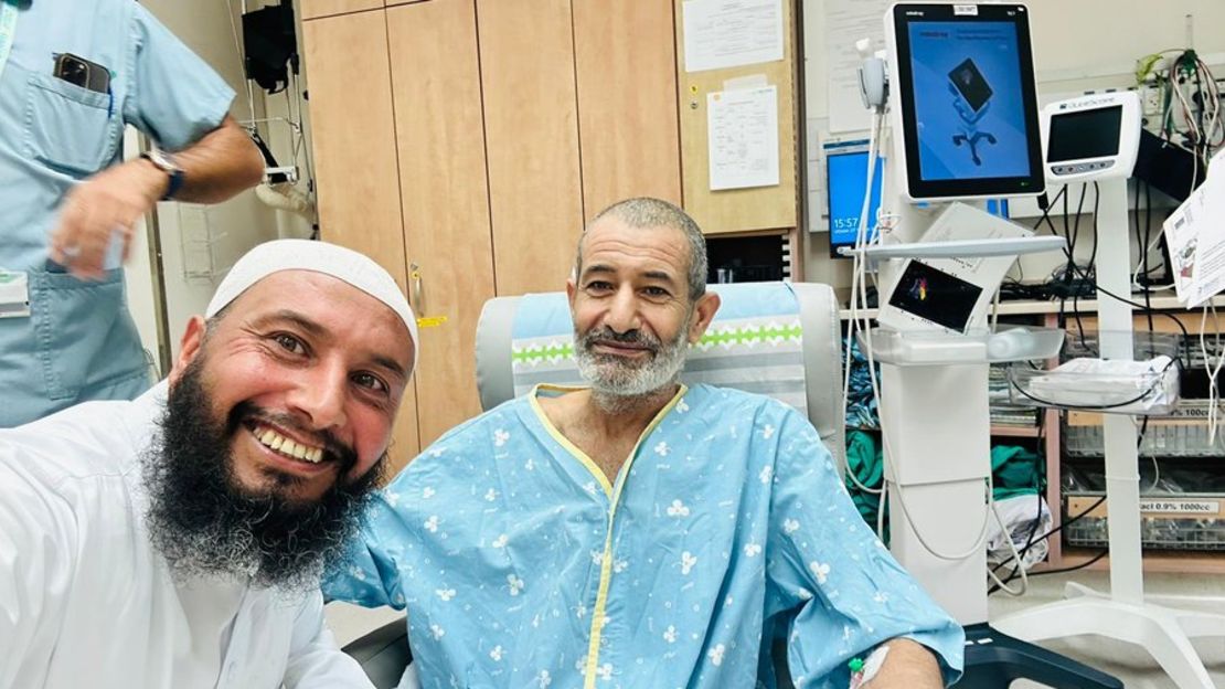 Al-Qadi, right, is pictured in an Israeli hospital with one of his brothers on Tuesday.