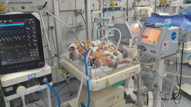 This is the heartbreaking reality inside Gaza’s hospitals today: four newborns crammed into a single incubator, simply because there aren’t enough neonatal intensive care units (NICUs) to meet the overwhelming need. This tragic overcrowding is not just a matter of missing equipment — it’s a direct consequence of the relentless war on Gaza and the suffocating blockade that has crippled the entire healthcare system. For months now, hospitals have been struggling to secure enough diesel fuel just to keep their generators running, rationing precious electricity hour by hour. Doctors and nurses, already overwhelmed by the constant influx of casualties and the mounting medical needs, face impossible choices: who gets the warmth of an incubator, who must share it with three other fragile lives, and who is left waiting. The siege has turned routine care for premature babies into a life-or-death struggle. No child should be born into a world where bombs and blockades decide whether they live or die. Yet this is the cruel reality for Gaza’s tiniest and most vulnerable, trapped in an endless cycle of war and deprivation they did nothing to cause.