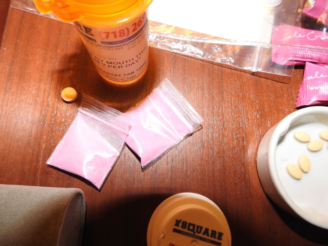 Photo evidence of a pink powder found by investigators was shown to the jury.