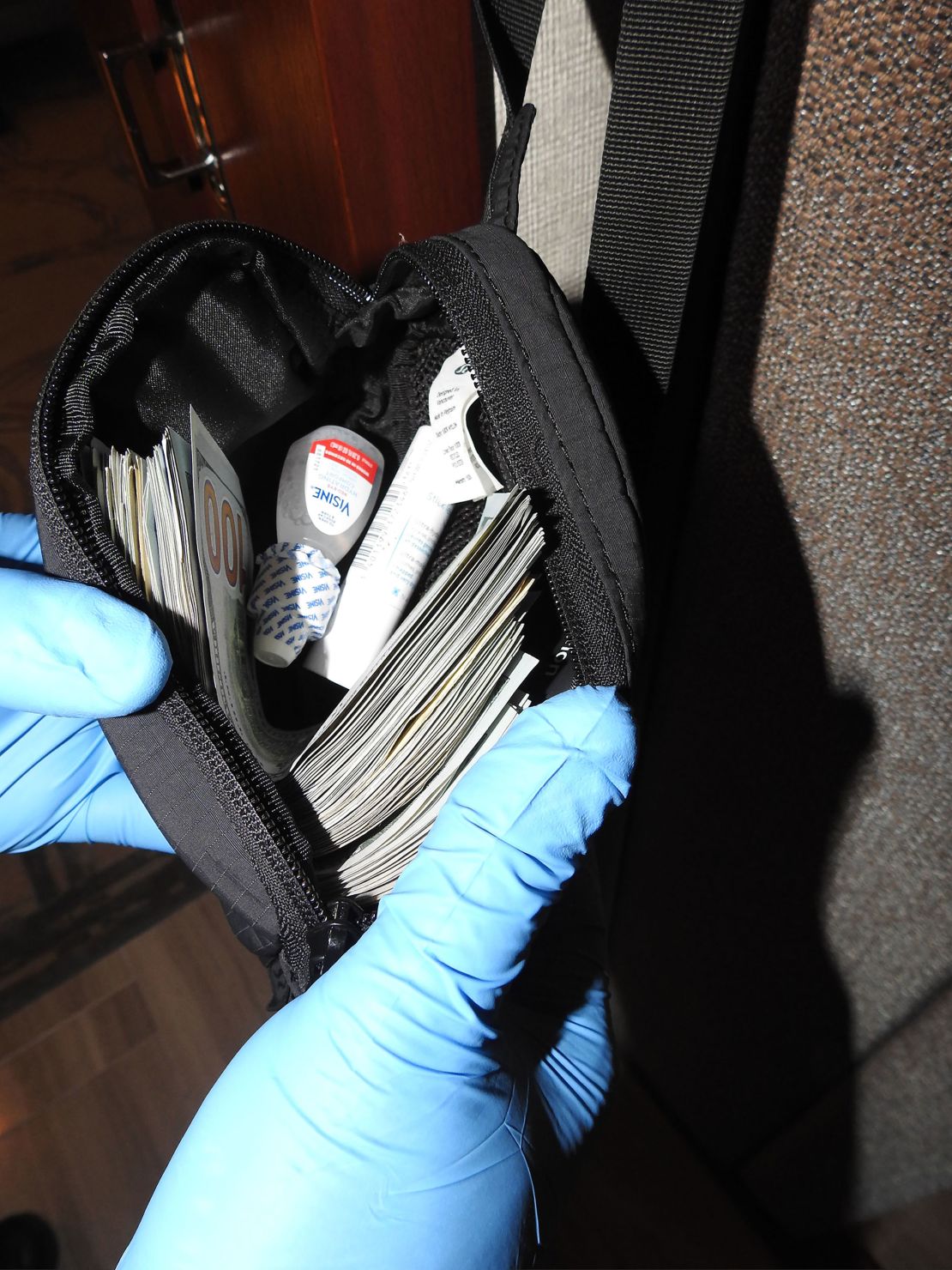About $9000 in cash was discovered in Combs' room, Binda testified.